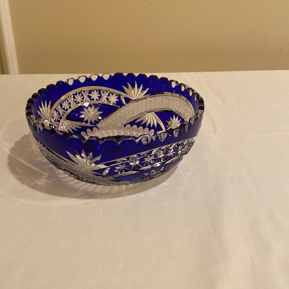 An 8” diameter crystal bowl In dark blue color